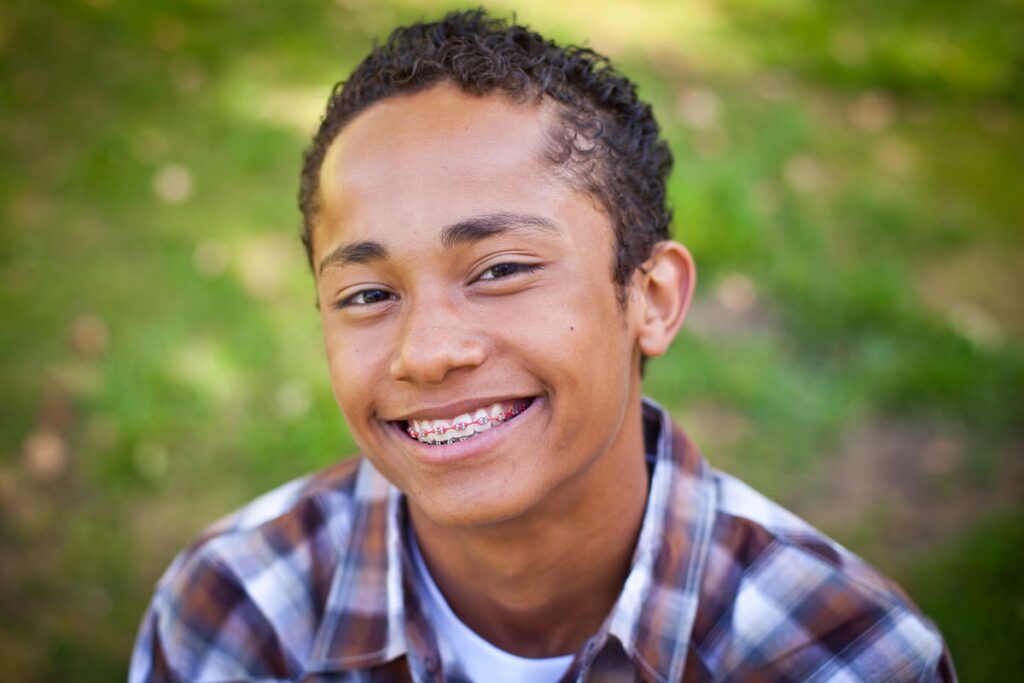 smiling boy with braces